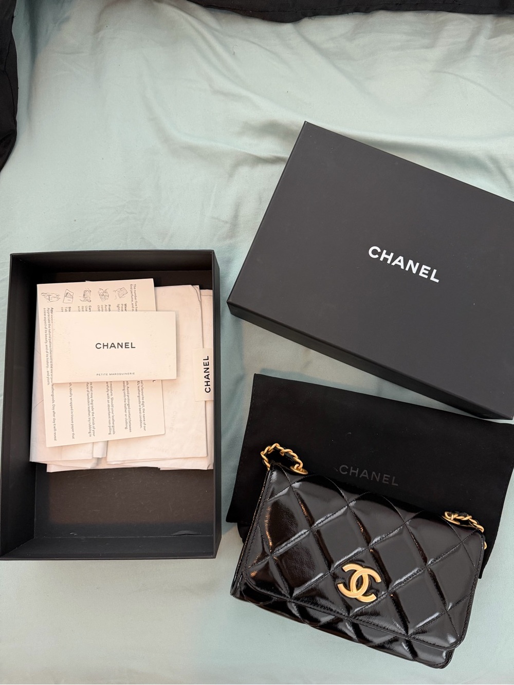 CHANEL Black Quilted Patent Leather Mini Flap with Gold Hardware